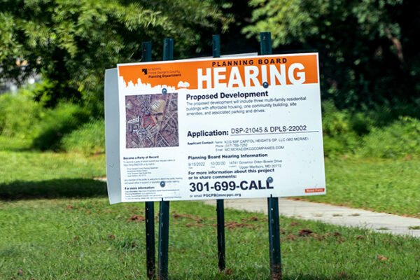 Planning Board Public Hearing sign or a proposed development