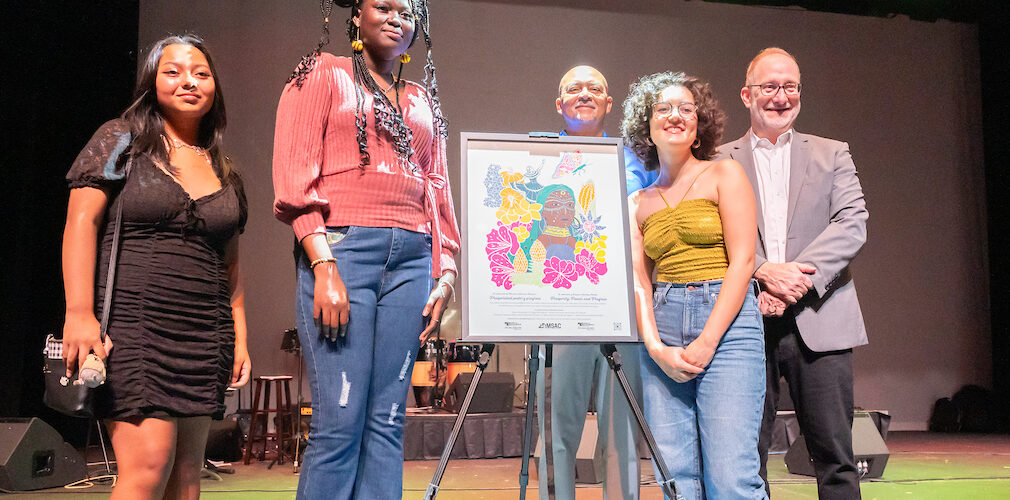 Hispanic Heritage month kickoff at publick playhouse September 16th 2023 artwork with young adult girls and older men in suits